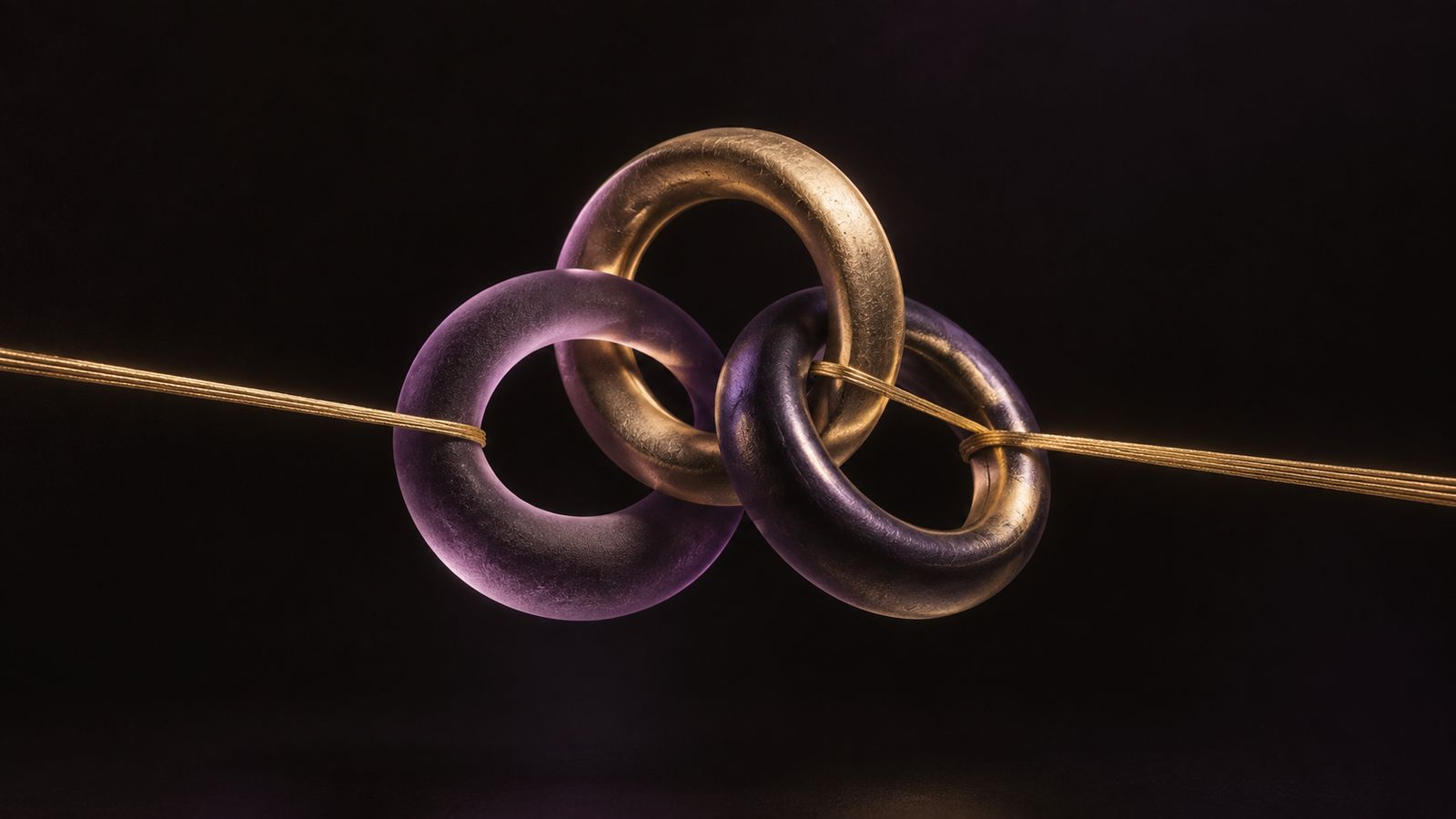 Abstract illustration: a gold thread passing through three linked rings